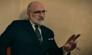 Shahid Bolsen speaking during a public appearance, highlighting his career and estimated net worth in 2026.